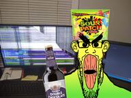 angry bottle candy chocolate_beer clothes computer ear food glasses green hat irl_background oh_my_god_she_is_so_attractive open_mouth sour sour_patch_kids soyjak stretched_mouth stubble variant:markiplier_soyjak yellow // 2048x1536 // 534.1KB