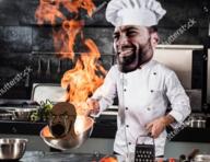 angry black_skin bloodshot_eyes chef chef_hat crying distorted gigachad glasses holding_object irl_background kitchen open_mouth smile smirk soyjak stock_image stretched_mouth stubble thick_eyebrows total_nigger_death variant:soyak yellow_sclera // 592x457 // 463.8KB