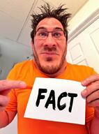 closed_mouth clothes fact finger glasses hair hand irl markiplier neutral sign stubble tshirt variant:markiplier_soyjak // 676x913 // 757.6KB