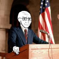 arm clothes concerned flag frown glasses hand irl_background lectern microphone necktie president soyjak star stubble suit united_states variant:soyak // 860x860 // 599.6KB